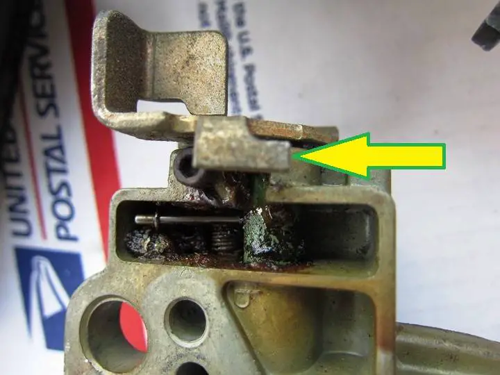 85 OEM 442 Carburetor secondary air valve tab factory mess up arrow.jpg