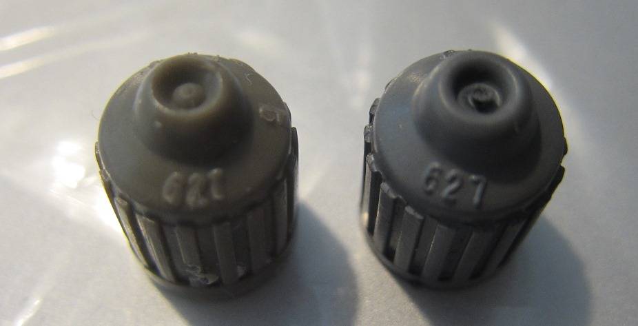 OEM DILL  gray valve stem cap vs Repro gray cap 1.JPG