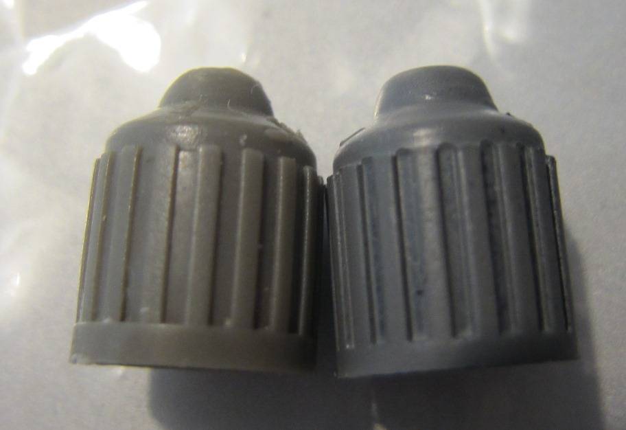 OEM DILL  gray valve stem cap vs Repro gray cap 2.JPG