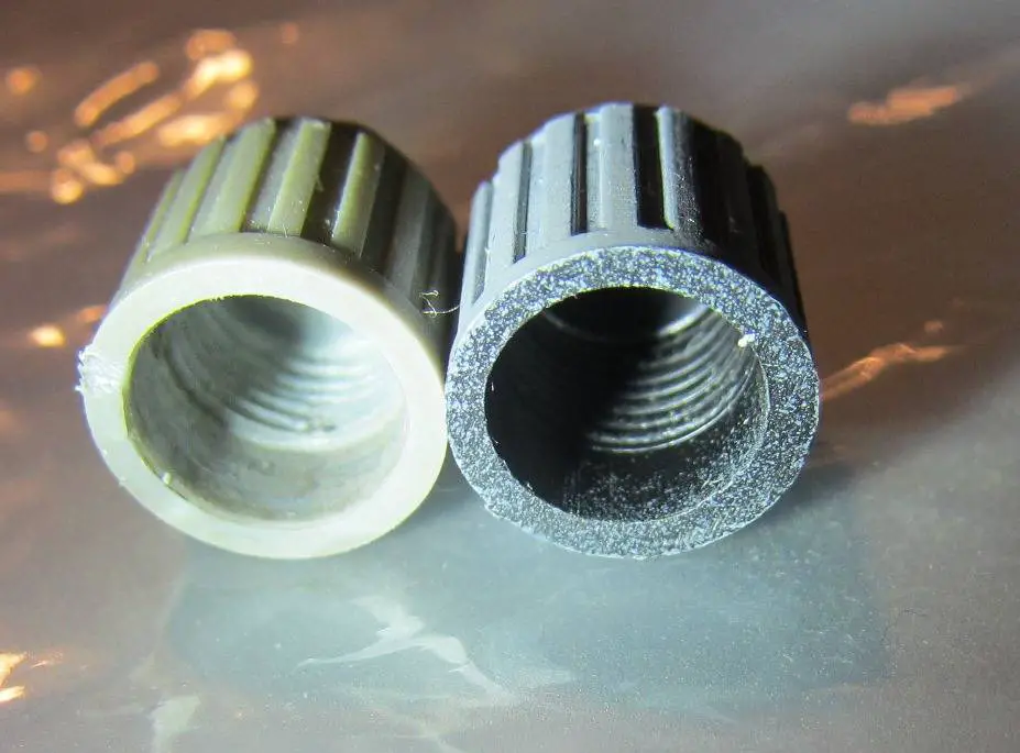 OEM DILL gray valve stem cap vs Repro gray cap 3.JPG