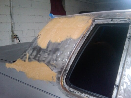 cutty vinyl top removal pass side in process.jpg