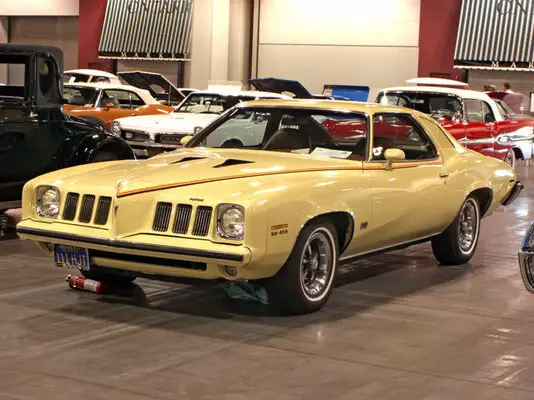 PontiacGrandAm1973yellowfads.jpg