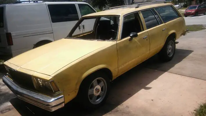 1980 Malibu Wagon and 1999 Astro Van2.jpg